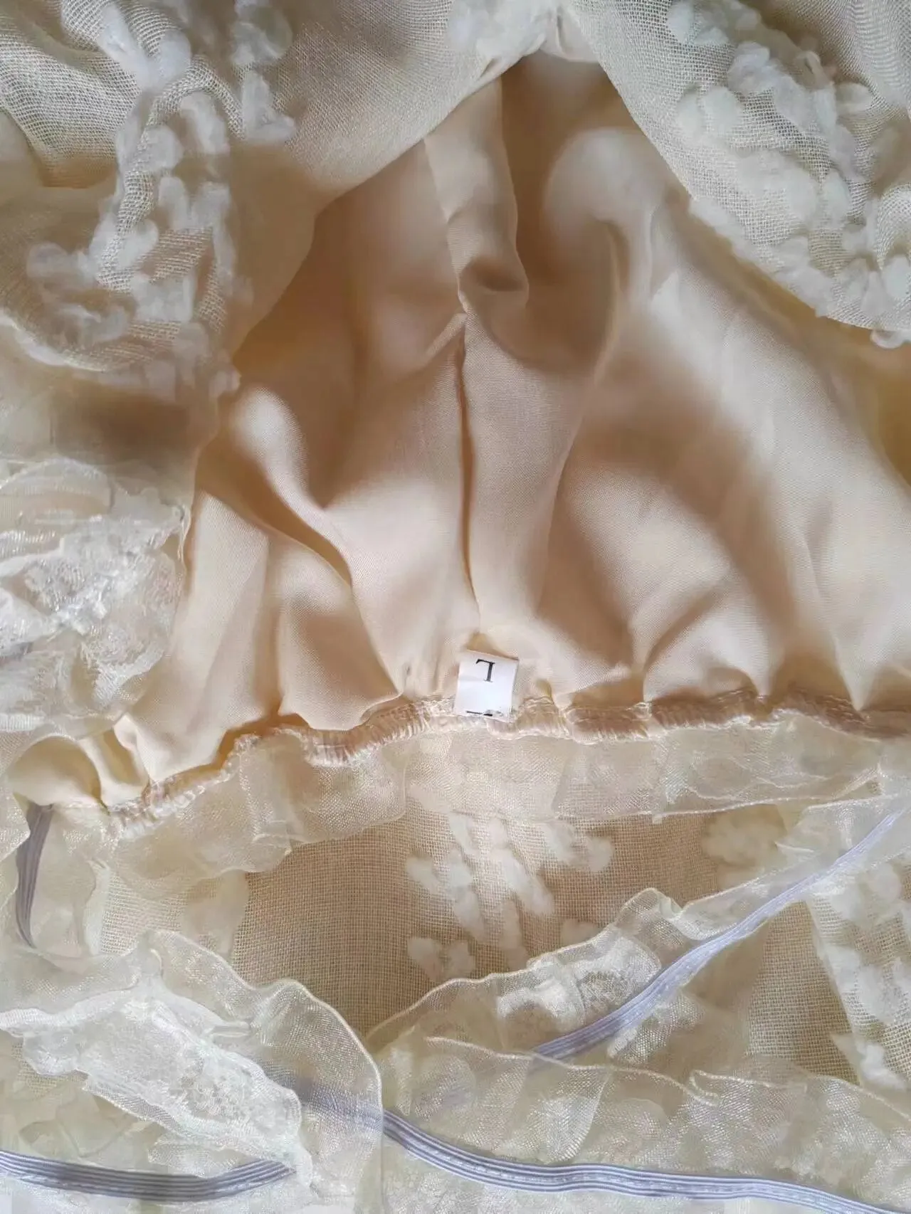 Stunning Floral Ball Gown with Modern Neckline and Elegant Floor-Length Skirt